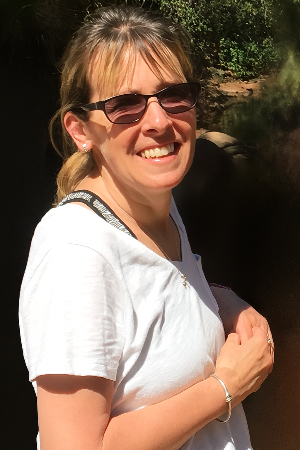 Laura Frank in front of a nature background