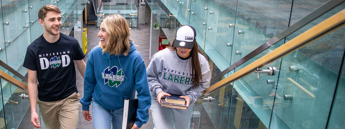 student with lake branded clothing