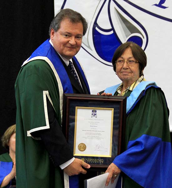 Muriel Sawyer receiving honorary doctorate