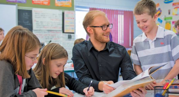 Education student teaching in a classroom