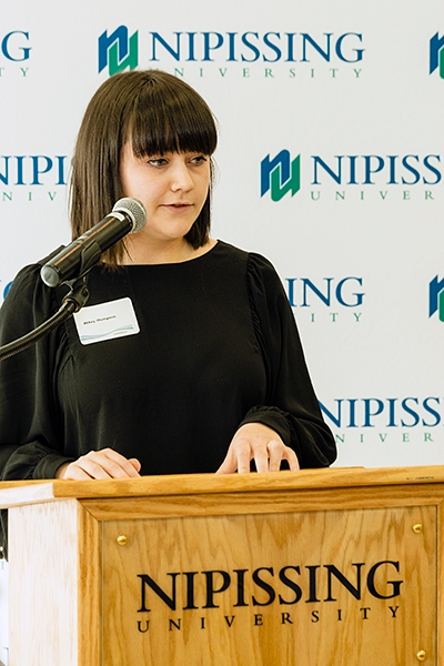 Abbey Thompson speaks at donor social