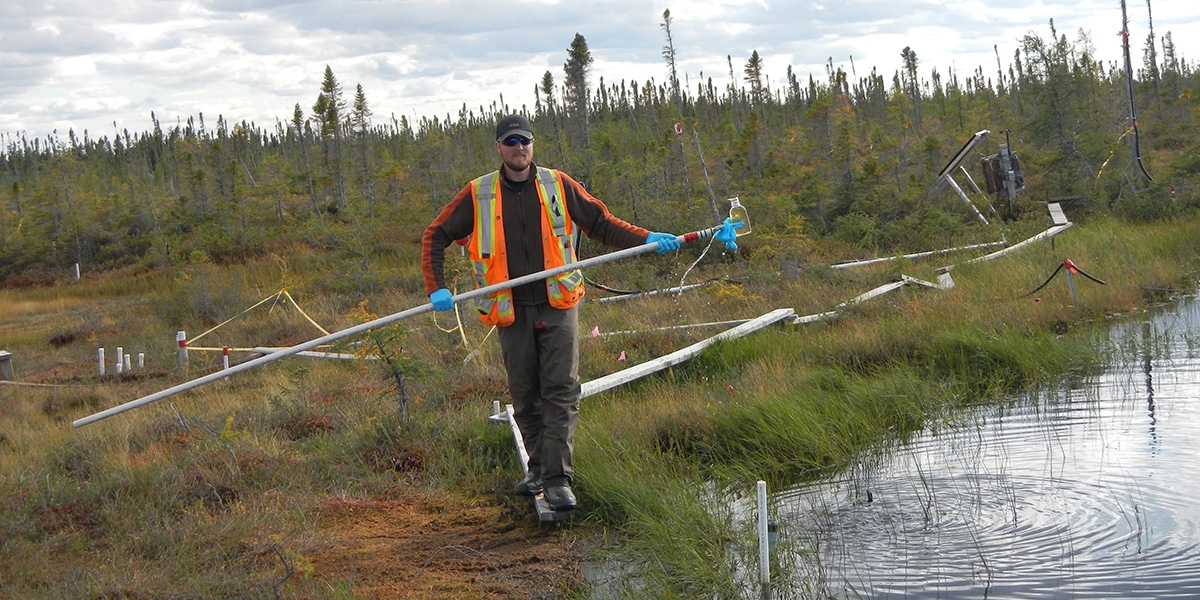 Dr. Colin McCarter near pond