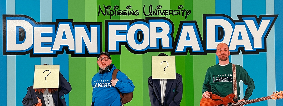 Nathan, Graydon and two students with post-its covering their faces