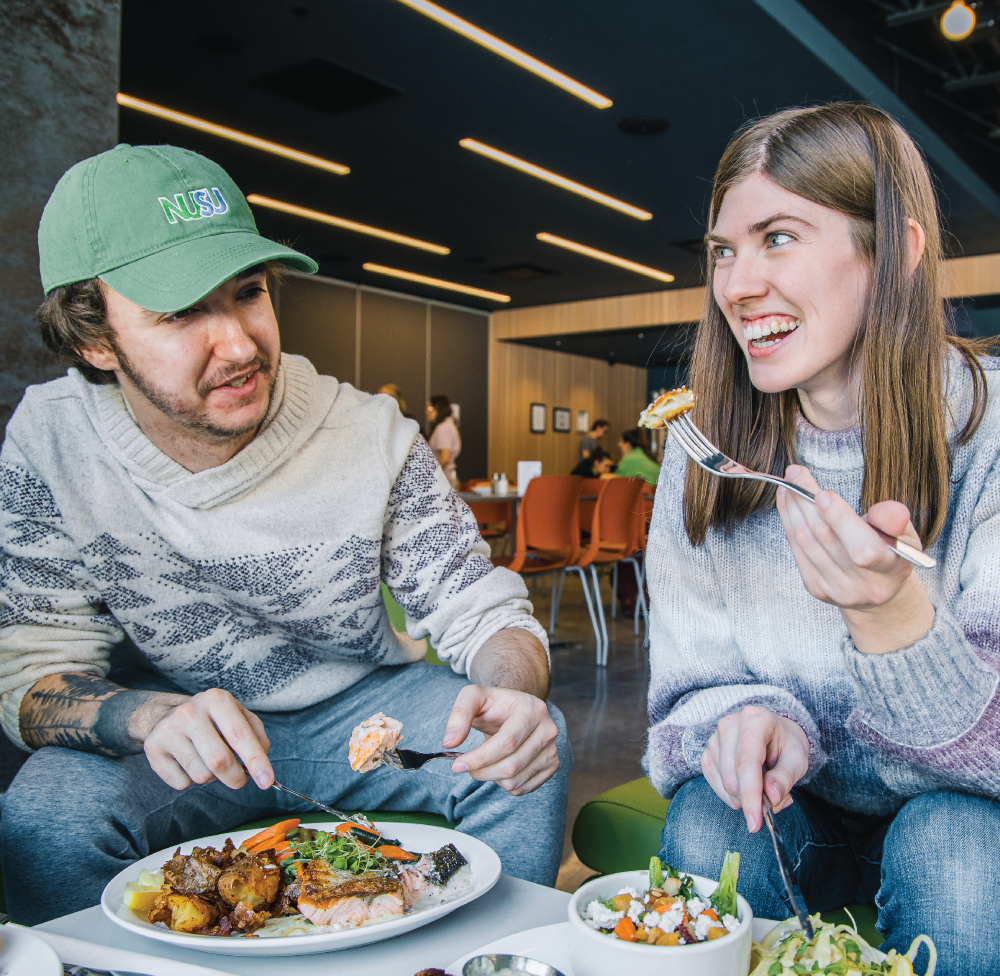 2 students eating at bay bistro