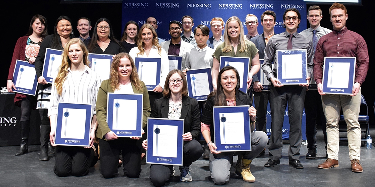 DMLA 2017 group with framed awards