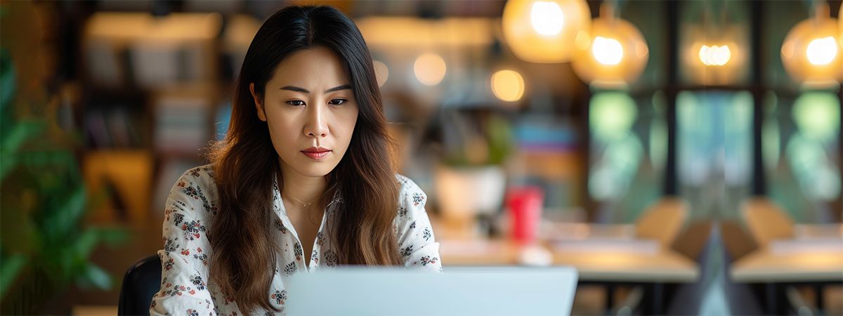 women working on online course