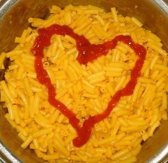 Photo of Kraft Dinner with a ketchup heart on it