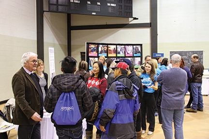 Photo of Open House information fair participants