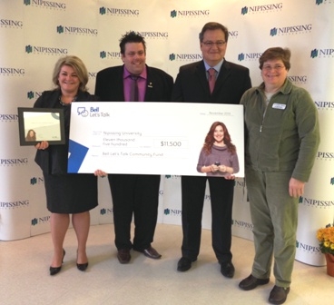 Photo of Bell Let's Talk cheque being presented to NU