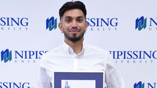 Deven Doodnath with award