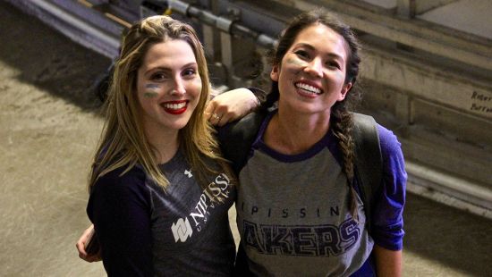 Two people at Hockey game