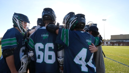 Lakers Lacrosse team is strategizing during NU Homecoming 2025