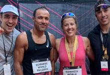 Alumni siblings Margarida and Paulo stand with their two brothers