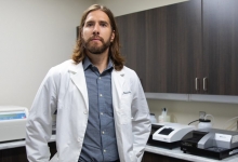 Dr. Steven Arnockyin his lab.