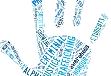 Photo of a word cloud in the shape of a handprint