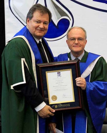 Donald Weaver with honorary doctorate