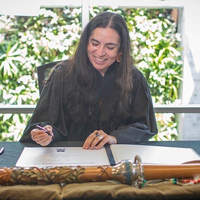 Tanya Talaga signing Honorary Degree register 2022