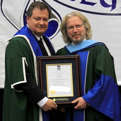 Giles Blunt with honorary doctorate