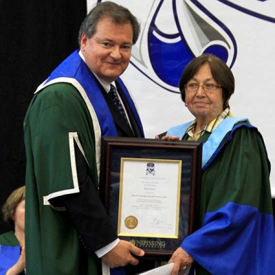 Muriel Sawyer receiving honorary doctorate