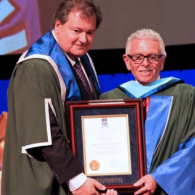Ron Jamieson receiving honorary doctorate